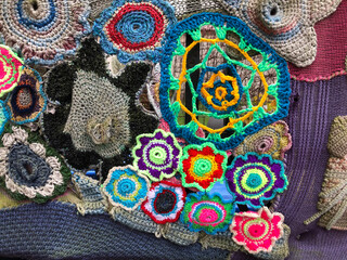 Crazy random knit flowers covering something