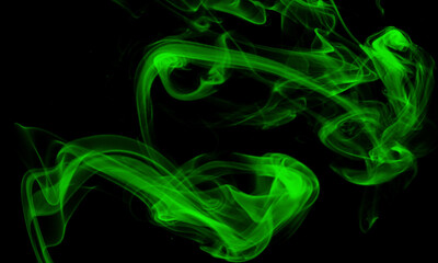 Abstract dark background. Green smoke. Science experiment concept...