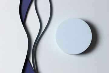 Empty round geometric shape podium platform on paper cut abstract minimal geometric shape blue...
