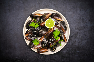 Raw mussels on the vintage background
