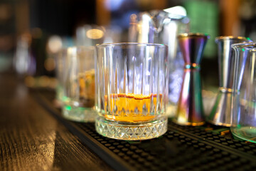 Glasses and dishes on the bar in a cafe.