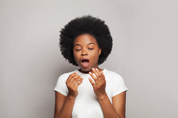  Sneezing woman on white background. Sneeze, cold and virus concept