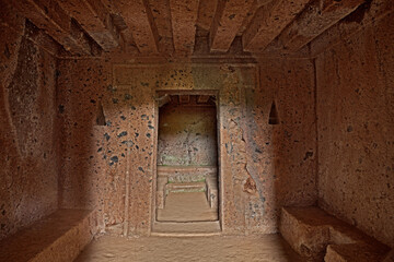Barbarano Romano, Viterbo, Lazio, Italy: Etruscan necropolis of San Giuliano, interior of an ancient tomb, 2500 years old, with the symbol of the door to the afterlife 