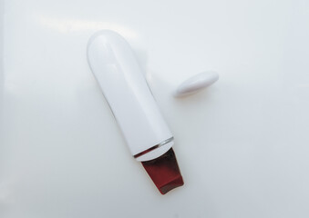 Ultrasonic skin cleaning device on a white background