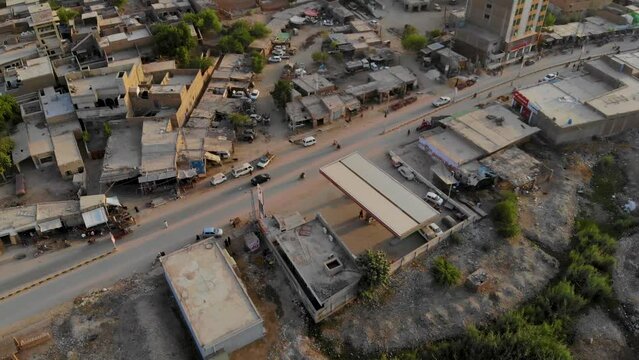 Aerial shot of village roads and houses of Rohri Sindh.  Aerial shot of Rohri city in Sindh province in Pakistan in summer during day time.	