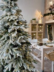 Christmas tree in the kitchen, comfort and warmth
