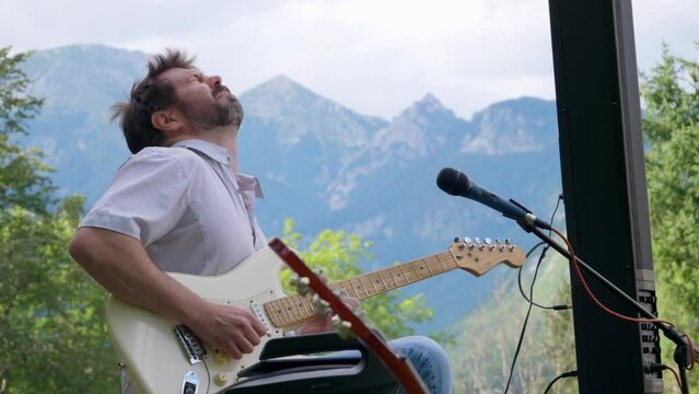 Guitar Player Emotional Feeling it Below Mountains Alps Slovenia