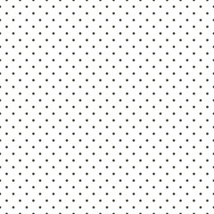 A pattern of dots on a white background. A simple, minimalistic background for use in any field. Printing on paper, textiles. Gift wrapping, printing on textiles for bedding.