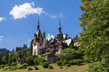 Fototapeta na wymiar Peles Castle (Castelul Peles) is a Neo-Renaissance castle in the Carpathian Mountains, near Sinaia, in Prahova County, on an existing medieval route linking Transylvania and Wallachia, Romania