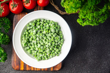 green pea frozen product fruit in a bowl fresh delicious snack healthy meal food snack diet on the table copy space food background rustic top view keto or paleo diet veggie vegan or vegetarian food
