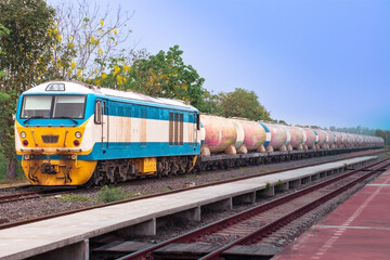 Fototapeta premium Freight train by diesel locomotive on the railway.