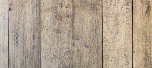 Fototapeta premium Natural wood floor texture. Wood prank with worn out surface. Teak background and vertical line.