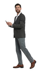 Handsome man with smartphone walking on white background