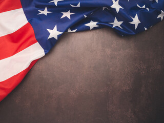 The American flag is on a vintage background with copy space for text