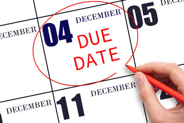 Hand writing text DUE DATE on calendar date December 4 and circling it. Payment due date