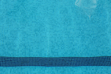 Empty swimming pool with clear water, above view