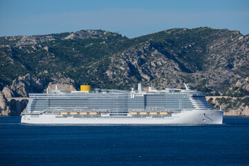 Costa cruiseship or cruise ship liner Toscana in Marseille Provence port during sunrise twilight...