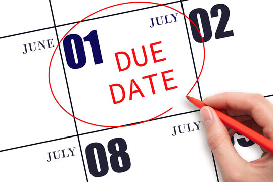 Hand Writing Text DUE DATE On Calendar Date July 1 And Circling It. Payment Due Date