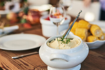 Mash potato, food and lunch for Christmas on a dining room table for celebration, nutrition and health. Healthy eating, dinner and lunch for Thanksgiving feast, dinner party or fine dining in a house