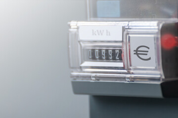 Dial with electric meter readings. The concept is the cost of consumed energy in euro. Display the...