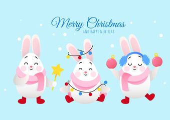 Obraz na płótnie Canvas Three cute Christmas bunnies on a blue background and it's snowing