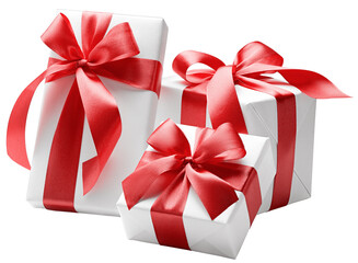 White gift boxes with red bows 