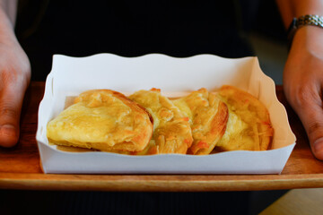 Food, desserts and sauces in a suki restaurant