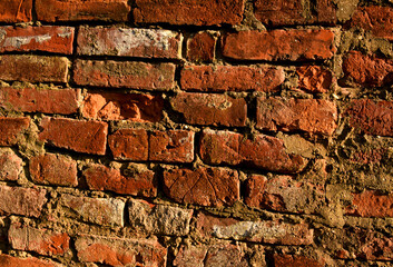 Brick wall background. Old brick texture on concrete wall. Bricks interior or exterior.