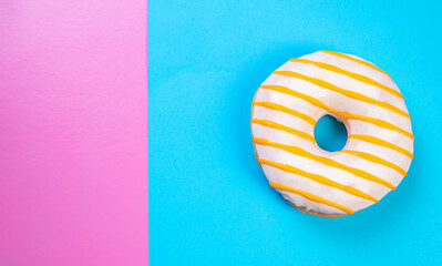 glazed donut on colorful background