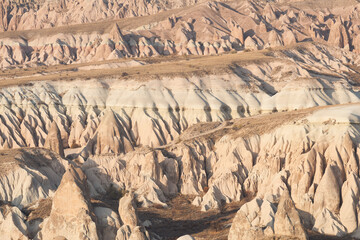 Stunning view of some rock formations in the Red & Rose Valley in Cappadocia during a beautiful...