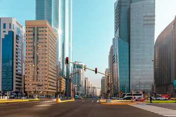 Naklejka premium Abu Dhabi Streets and Skyscrapers. Tall Modern Glass Buildings in Abu Dhabi. United Arab Emirates.