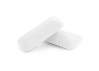 Two pieces of chewing gum on white background