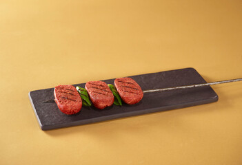 grilled sausage and green peppers, Turkish sucuk