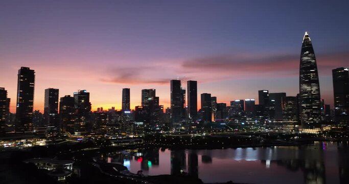 Shenzhen ,China - Circa 2022: Aerial footage of landscape at sunset in shenzhen city, China 
