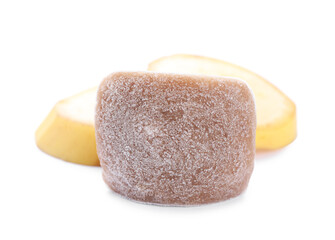 Frozen banana puree cube and fruits on white background