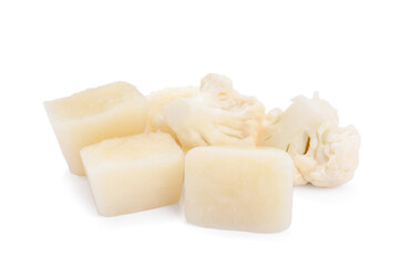 Frozen cauliflower puree cubes and fresh cauliflower isolated on white