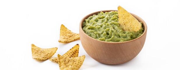 Mexican guacamole with nacho chip isolated on white background. Copy space. Panorama view