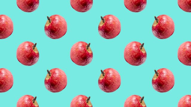 Red apples in geometric grid in seamless loop pattern on a light blue background. Exotic fruits in seamless loop animation. Endless food motion graphic background