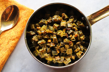 Bhindi Masala, stir-fried okra with Indian spices. Ladyfinger fry. Copy space. Bhendi ki sabzi.