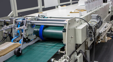 Production of automatic box folder gluer machine for box or carton packaging. Printing industry	