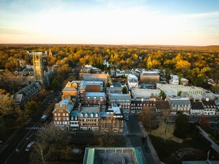 Drone view of golden sunrise over Princeton New Jersey. Cityscape with famous landmarks