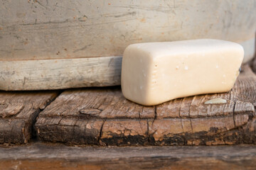 rustic handmade soap next to old washboard