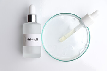 Malic acid in a bottle, chemical ingredient in beauty product