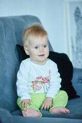 Fototapeta premium A small newborn baby girl. The concept of childhood and motherhood.
