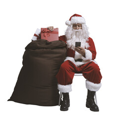 PNG file no background Santa Claus sitting and chatting with his phone