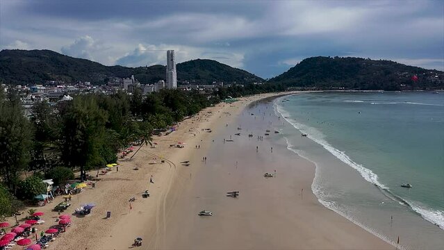 Thailand travel city Patong beach Cinematic video 4K. Aerial view shot on drone camera high quality View of Patong beach Phuket Thailand