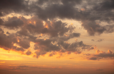Colorful clouds at sunset as background.