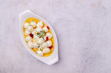 Cheese with oil and spices