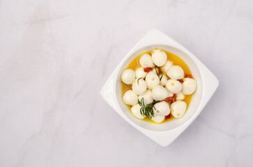 Cheese with oil and spices