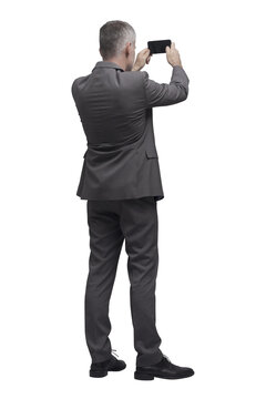 Businessman Taking Pictures With His Smartphone PNG File No Background